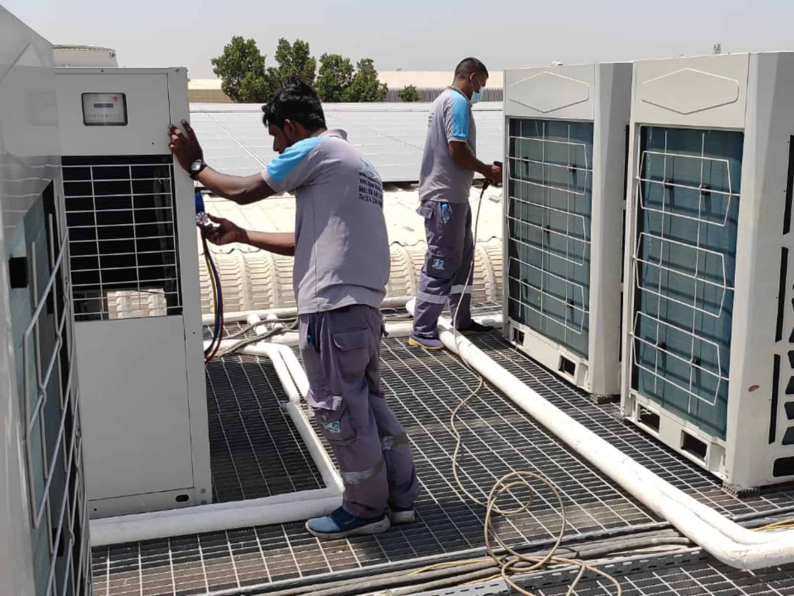 RepairWalla AC technician repairing a split AC unit in Panaji, Goa